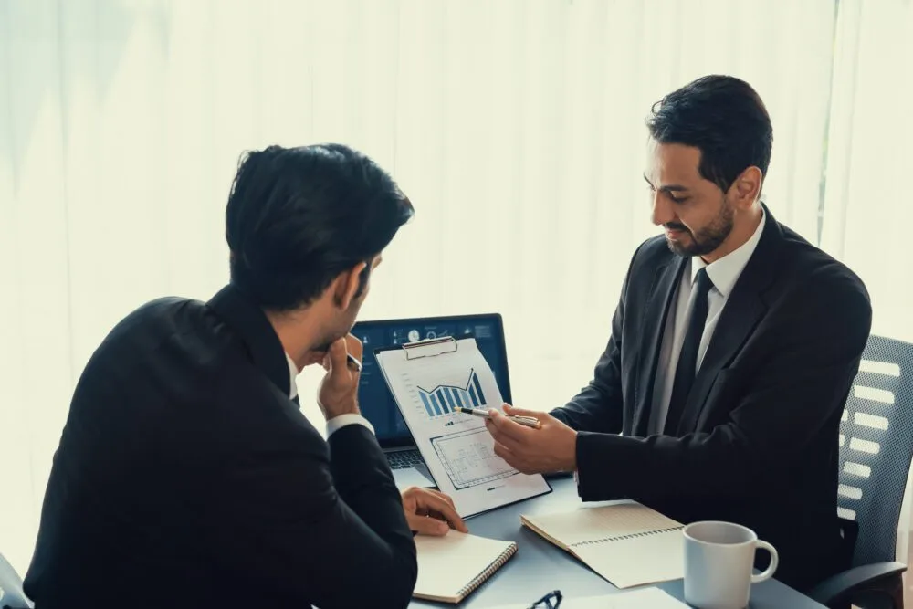 Friendly New Zealand self-employed income protection insurance adviser at work